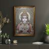 Invite the auspicious presence of Lord Rama into your home with this exquisite, jewel-embellished artwork. Portrayed with a calm and compassionate demeanor, Lord Rama's divine form is adorned with a resplendent crown, intricate necklaces, and garlands of flowers, all brought to life with shimmering crystals and detailed artistry. His right hand is raised in the Abhaya Mudra, offering reassurance and dispelling fears. The radiant halo behind him signifies his divine light and purity. This sacred piece is ideal for your puja room, meditation space, or living area, serving as a constant source of inspiration, peace, and protection for your family.